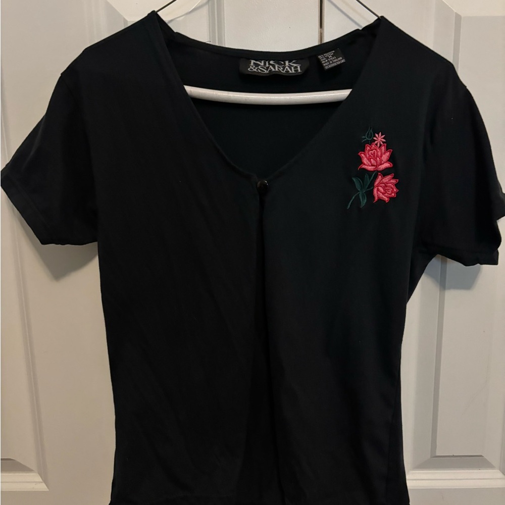 Elegant Black Top with Pink Floral Design